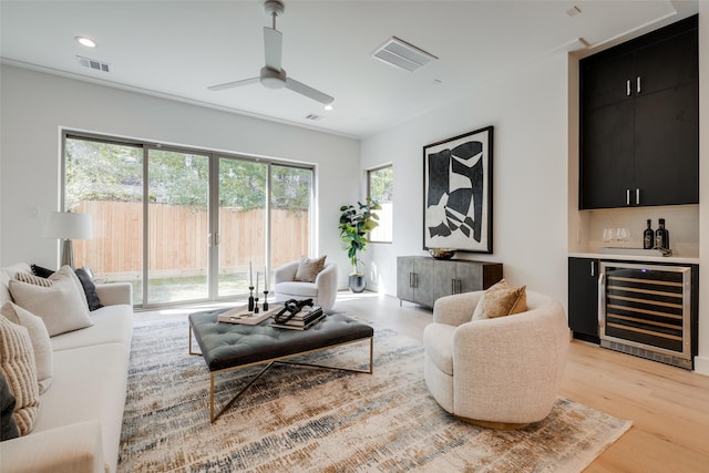 1609 Park St, Houston, TX 77019 - living room with wine cooler, a dry bar, plenty of natural light, ceiling fan, and recessed lighting