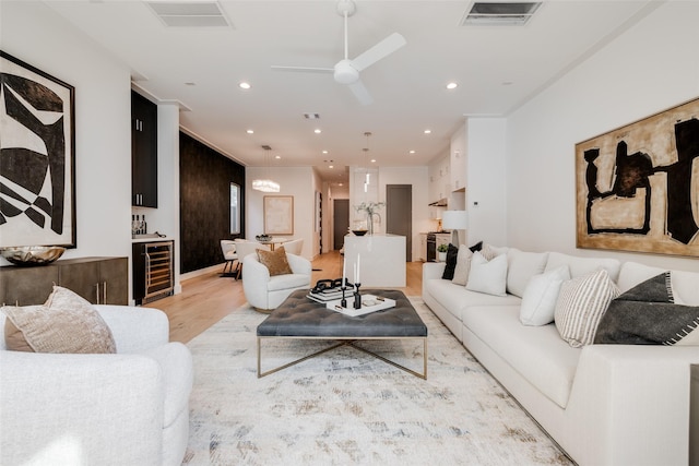 1609 Park St, Houston, TX 77019 - living area featuring beverage cooler, light wood-type flooring, ceiling fan, and recessed lighting