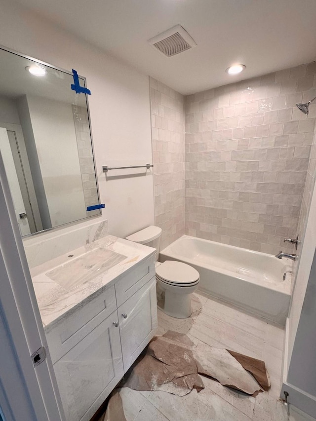 1609 Park St, Houston, TX 77019 - full bath with vanity, toilet, tub / shower combination, and recessed lighting