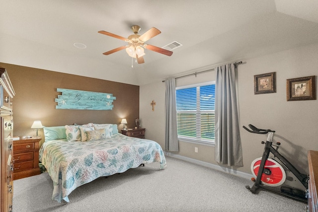 bedroom featuring visible vents, lofted ceiling, a ceiling fan, carpet, and baseboards