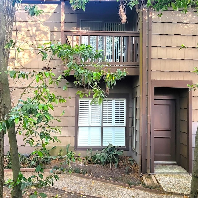 doorway to property with a balcony