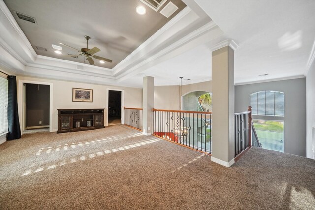 18719 Rusty Anchor Ct, Humble, TX 77346 - unfurnished living room featuring a raised ceiling, a ceiling fan, visible vents, and ornamental molding
