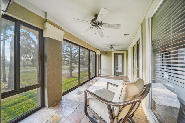 18719 Rusty Anchor Ct, Humble, TX 77346 - sunroom / solarium featuring visible vents and ceiling fan