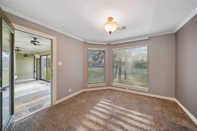 18719 Rusty Anchor Ct, Humble, TX 77346 - empty room with visible vents, baseboards, ornamental molding, carpet flooring, and a ceiling fan