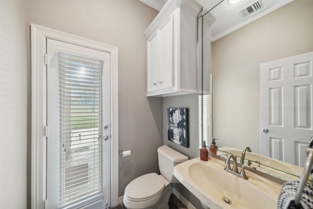18719 Rusty Anchor Ct, Humble, TX 77346 - half bath with visible vents, toilet, and a sink
