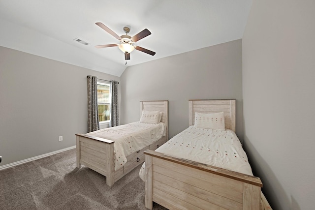 bedroom featuring visible vents, baseboards, carpet, lofted ceiling, and ceiling fan