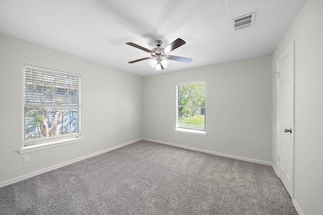 8355 Glencrest St, Houston, TX 77061 - carpeted empty room with a ceiling fan and baseboards