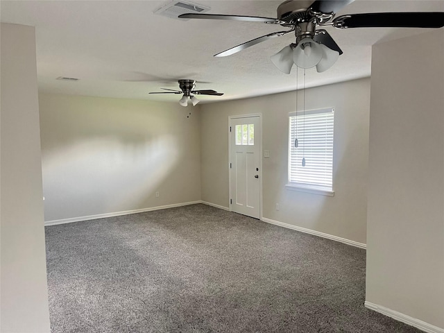 8355 Glencrest St, Houston, TX 77061 - carpeted entryway featuring a ceiling fan and baseboards