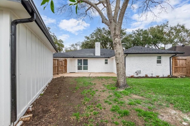 view of yard with fence and a patio area
