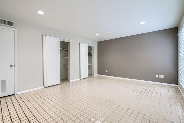 6008 Inwood Dr, Houston, TX 77057 - unfurnished bedroom featuring visible vents, recessed lighting, and baseboards