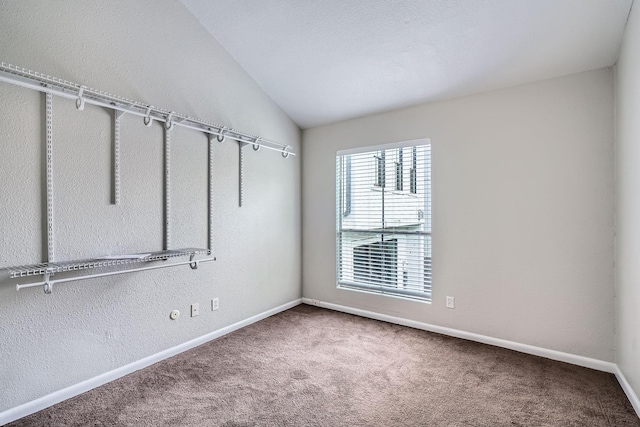 6008 Inwood Dr, Houston, TX 77057 - carpeted empty room featuring baseboards and lofted ceiling