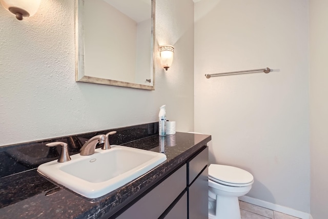 6008 Inwood Dr, Houston, TX 77057 - bathroom featuring toilet, tile patterned flooring, and vanity