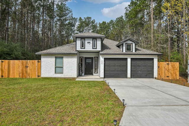 298 County Road 3545, Cleveland, TX 77327 - view of front of property with driveway, an attached garage, roof with shingles, and a gate