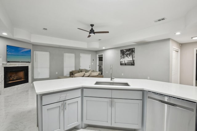 298 County Road 3545, Cleveland, TX 77327 - kitchen with dishwasher, a sink, open floor plan, ceiling fan, and recessed lighting