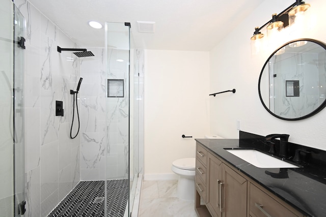 full bath with a marble finish shower, baseboards, toilet, marble finish floor, and vanity