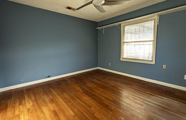 1922 Tabor St, Houston, TX 77009 - empty room with a ceiling fan, hardwood / wood-style flooring, and baseboards