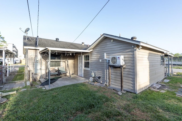 1922 Tabor St, Houston, TX 77009 - back of property with a patio area and a cooling unit