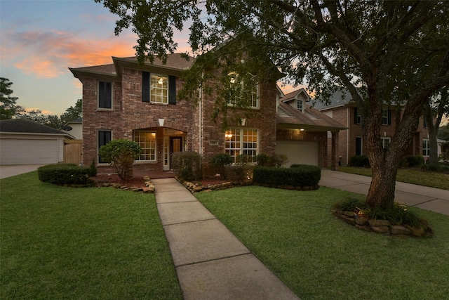 5310 Fairwick Ct, Katy, TX 77450 - view of front of home with concrete driveway, brick siding, and a front yard