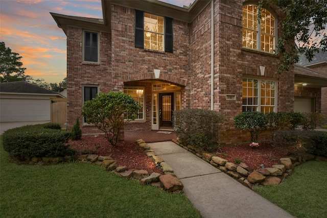 5310 Fairwick Ct, Katy, TX 77450 - view of front of house with brick siding, a garage, and a front lawn