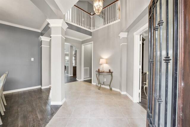 5310 Fairwick Ct, Katy, TX 77450 - foyer with visible vents, arched walkways, decorative columns, and baseboards