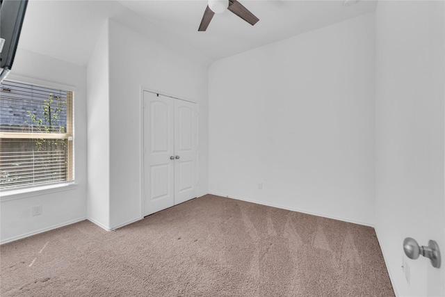 18406 Hilltop Climb Dr, Hockley, TX 77447 - spare room featuring a ceiling fan, baseboards, and carpet