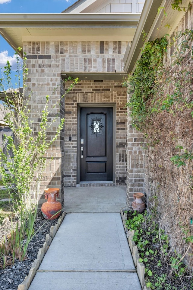 18406 Hilltop Climb Dr, Hockley, TX 77447 - view of exterior entry featuring brick siding