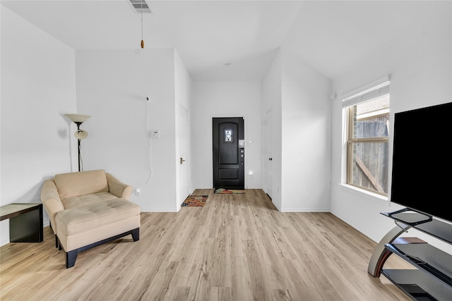 18406 Hilltop Climb Dr, Hockley, TX 77447 - foyer entrance with visible vents, light wood finished floors, and baseboards