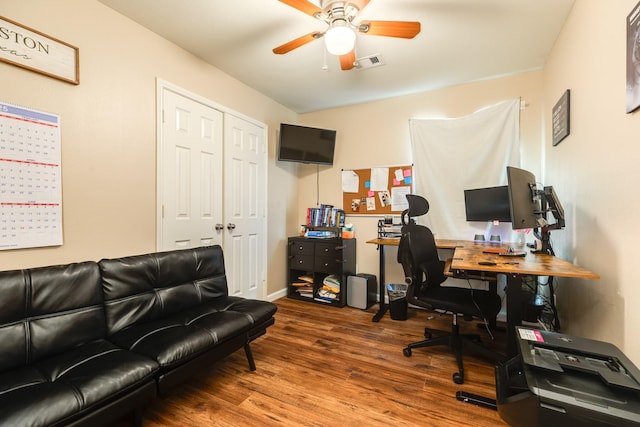 9411 Emerald Green Dr, Rosharon, TX 77583 - office area featuring visible vents, baseboards, wood finished floors, and a ceiling fan