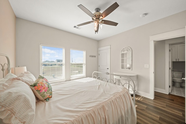 23194 Camino St, Galveston, TX 77554 - bedroom with dark wood-type flooring, ceiling fan, baseboards, and visible vents