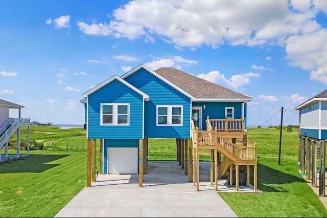 23194 Camino St, Galveston, TX 77554 - view of jungle gym featuring stairway and a lawn