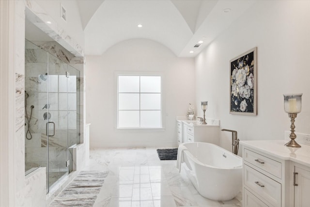 full bath featuring visible vents, a marble finish shower, marble finish floor, and a freestanding bath