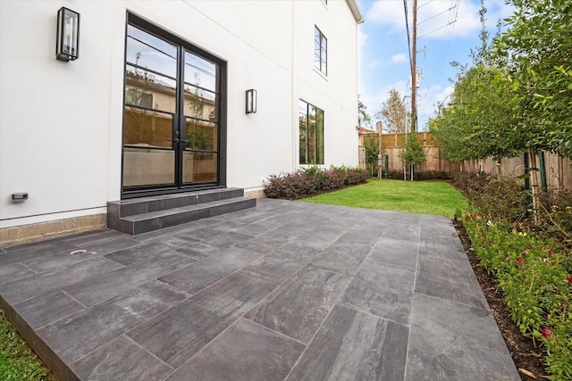 view of patio featuring a fenced backyard and entry steps