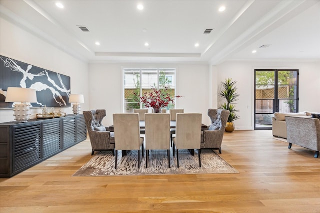 dining space featuring recessed lighting, visible vents, and light wood-type flooring