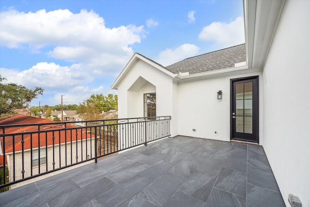 view of patio with a balcony