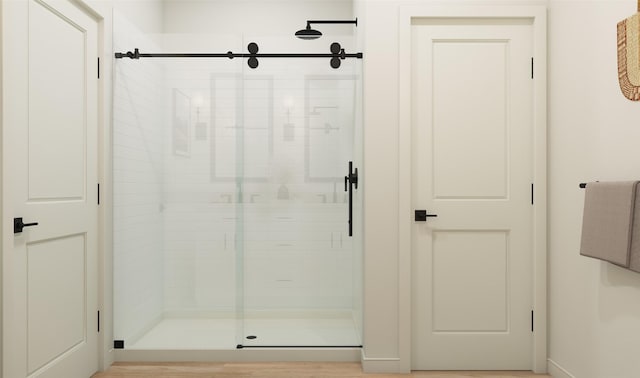 bathroom featuring a shower stall