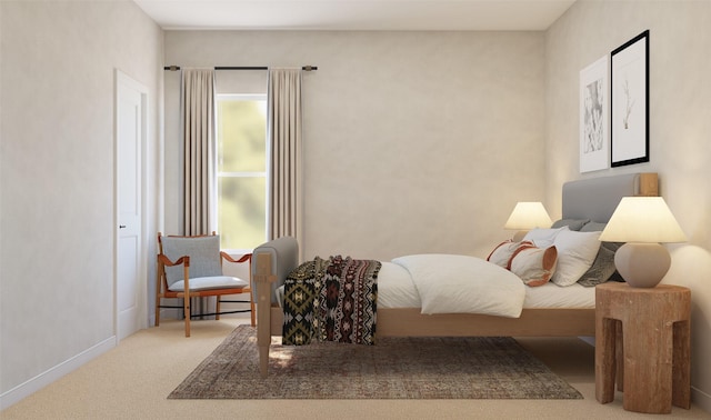 carpeted bedroom featuring baseboards