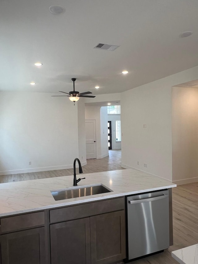 2243 Garden Arbor, Tomball, TX 77375 - kitchen featuring stainless steel dishwasher, a sink, ceiling fan, light wood-style flooring, and recessed lighting