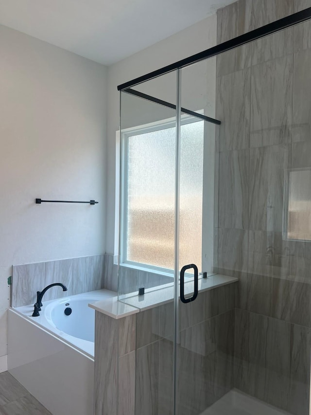 2243 Garden Arbor, Tomball, TX 77375 - bathroom with a garden tub and a shower stall