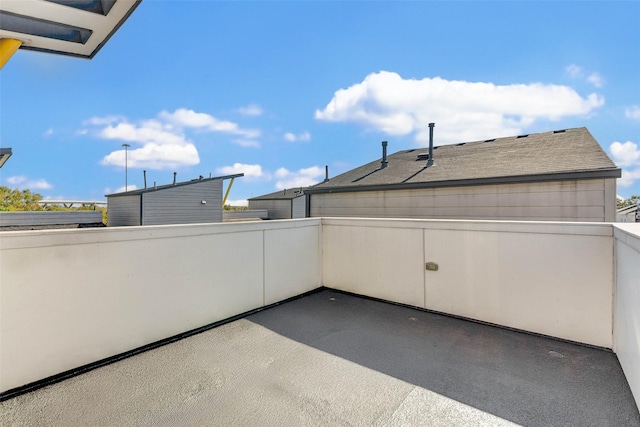 view of patio / terrace with a balcony