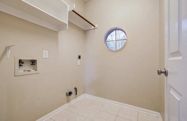 clothes washing area with hookup for a gas dryer, washer hookup, electric dryer hookup, laundry area, and light tile patterned floors