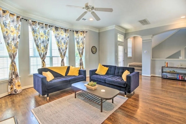 207 Knox St, Houston, TX 77007 - living area with visible vents, ceiling fan, ornamental molding, wood finished floors, and arched walkways
