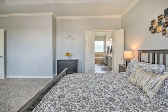 207 Knox St, Houston, TX 77007 - bedroom with baseboards, light carpet, ensuite bath, and crown molding
