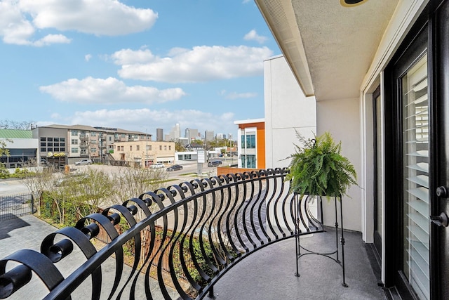 balcony featuring a city view