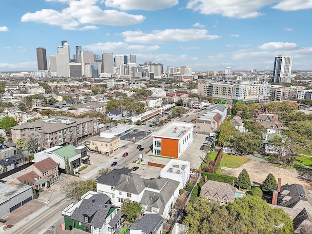 birds eye view of property with a city view