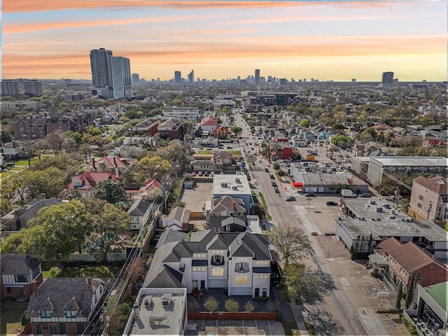 aerial view at dusk with a view of city