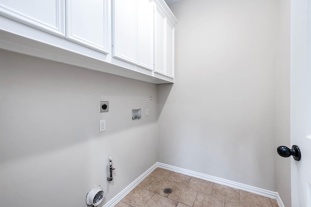805 Columbia St, Houston, TX 77007 - clothes washing area featuring gas dryer hookup, baseboards, cabinet space, electric dryer hookup, and hookup for a washing machine
