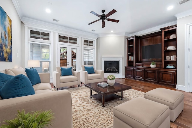 805 Columbia St, Houston, TX 77007 - living room with ceiling fan, wood finished floors, french doors, ornamental molding, and recessed lighting