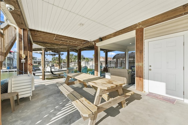22102 Pecos Dr, Galveston, TX 77554 - view of patio / terrace with outdoor dining space