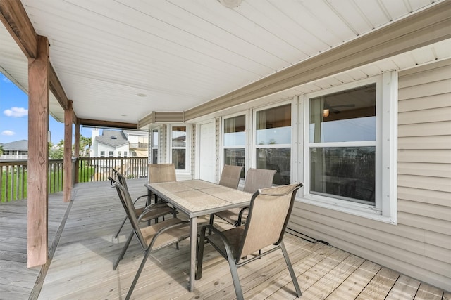 22102 Pecos Dr, Galveston, TX 77554 - wooden terrace with outdoor dining area