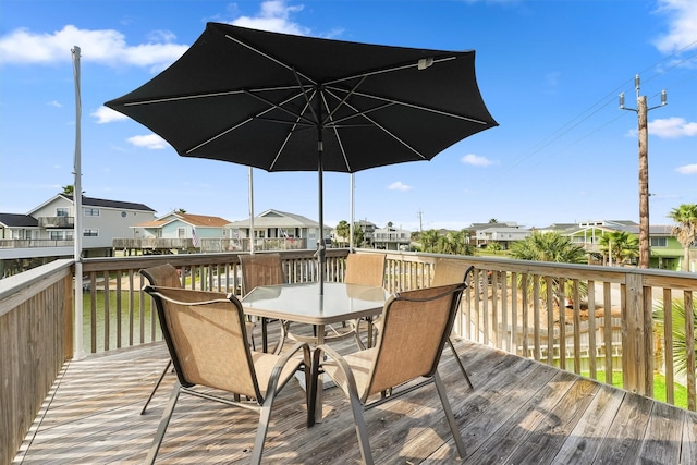 22102 Pecos Dr, Galveston, TX 77554 - wooden deck with a residential view and outdoor dining space
